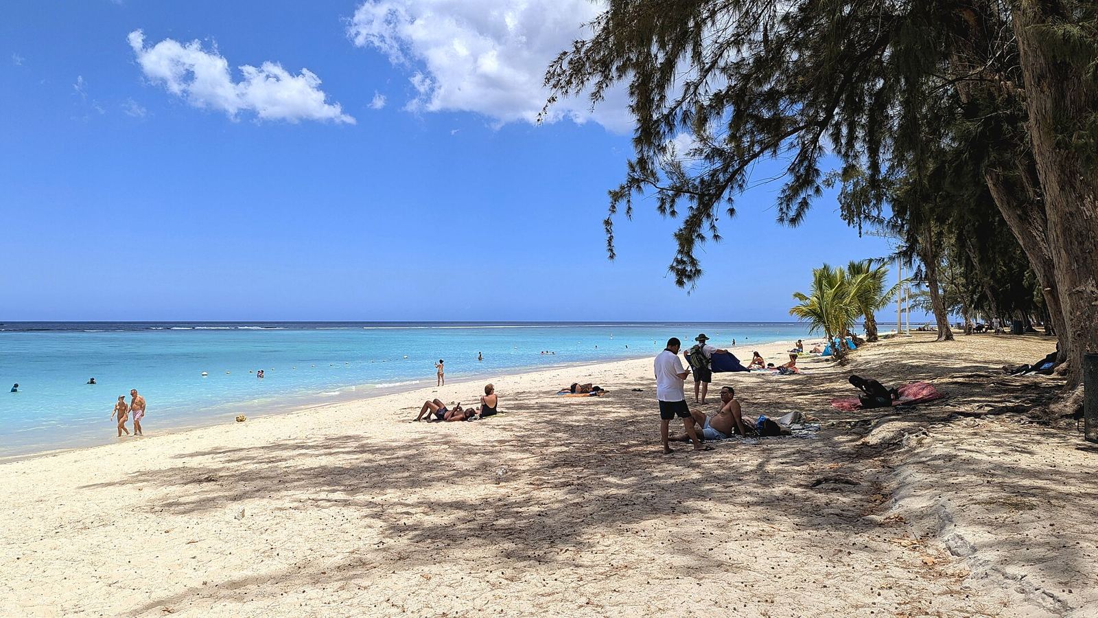 A sunny beach in Mauritius with turquoise water